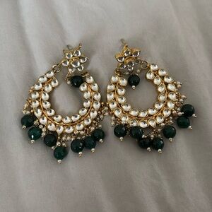 Kundan statement earrings in dark green